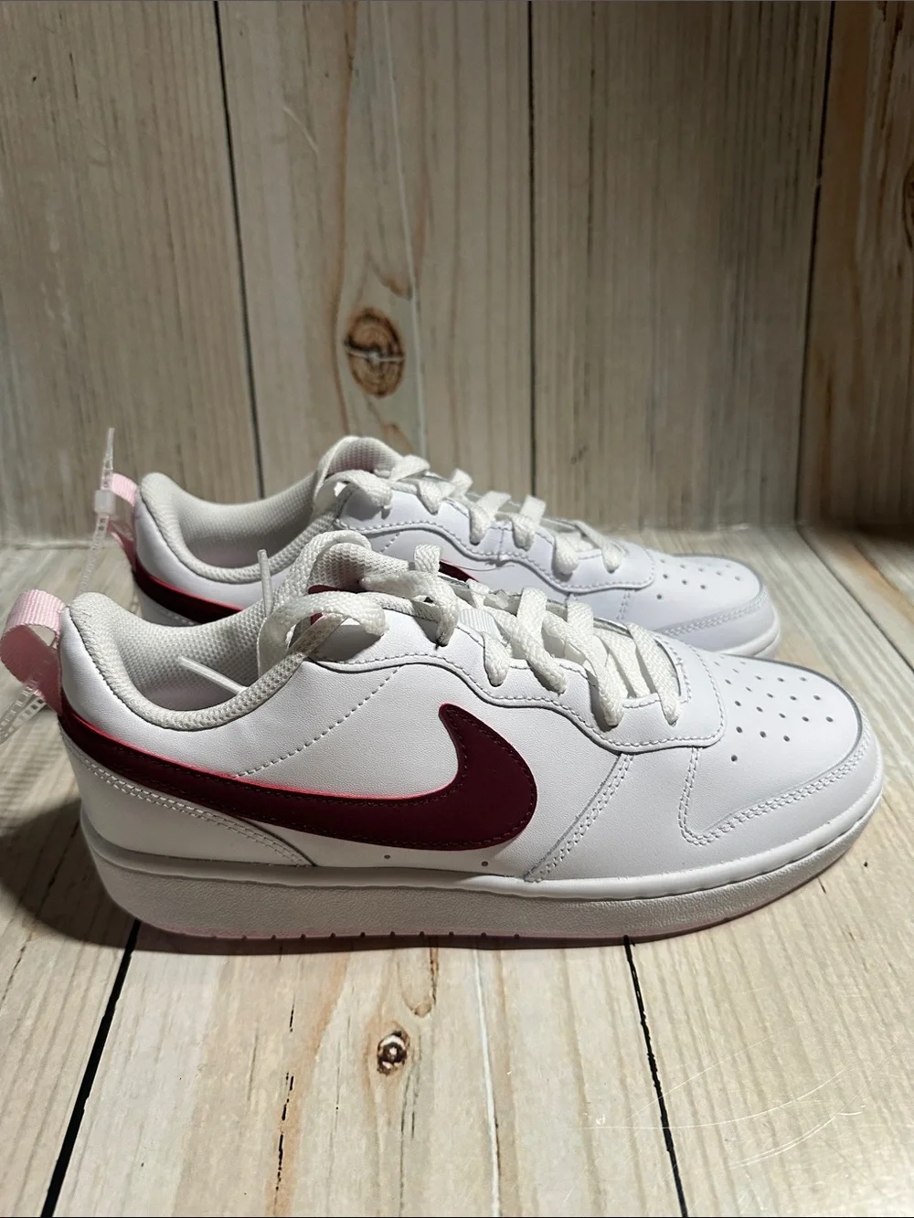 Nike White Sneakers with Maroon Swoosh and Pink Heel Tab